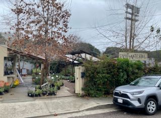 The sign above Plant Material in Glassell Park.